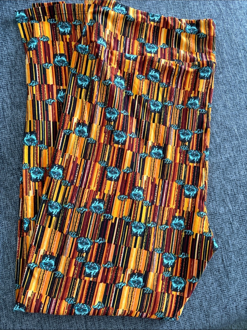 Women's Turquoise Floral Stripe Leggings - Vibrant Orange Pattern